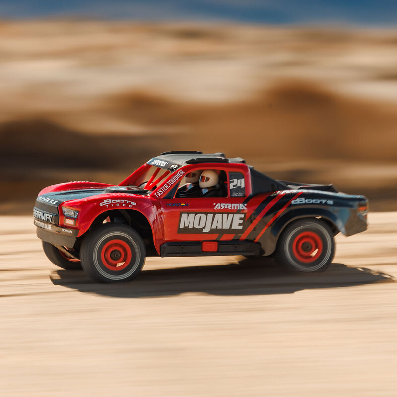 ARA2104T1_A18_65K78UMI.jpg 1/16 MOJAVE GROM 4X4 RTR Brushed Desert Truck (Battery & Charger Included), Red/Black - Image 1